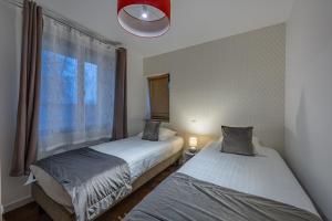 Appartements LOGIS DU GRAND PIN : photos des chambres