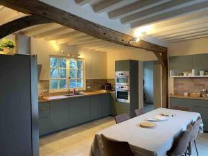 Maisons de vacances Maison renovee - jacuzzi et cheminee : photos des chambres