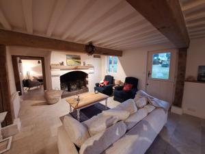 Maisons de vacances Maison renovee - jacuzzi et cheminee : photos des chambres