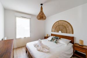Appartements Le souffle de Vendays - Appt avec jardin : photos des chambres