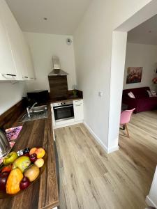 Appartements Maison des Fleurs T2 COSY : photos des chambres