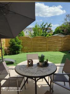 APPARTEMENT 3 pièces avec TERRASSE et JARDIN
