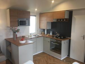 Campings Mobil-home 40m2, camping les Charmettes 4 etoiles La Palmyre 4-6 personnes-2 chambres dont 1 suite parentale-2 salles de bain : photos des chambres