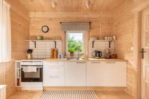 Chatka Pod Sosnami - mały dom