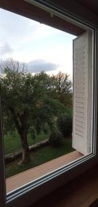 Sejours chez l'habitant Chambre cozy et calme dans une maison de charme : Chambre Double - Vue sur Jardin