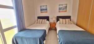 Apartamento con terraza en primera línea de playa