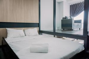 Wonderful and Homey Studio The Smith Alam Sutera Apartment By Travelio