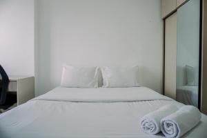 Restful and Homey Studio Apartment M-Town Residence By Travelio