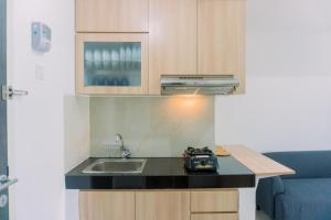Minimalist and Comfort 2BR Serpong Garden Apartment By Travelio