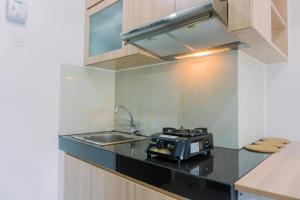 Minimalist and Comfort 2BR Serpong Garden Apartment By Travelio