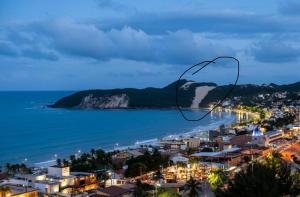 Pe na areia com vista