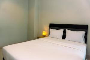 Nice and Elegant 2BR Apartment at Springhill Terrace Residence By Travelio