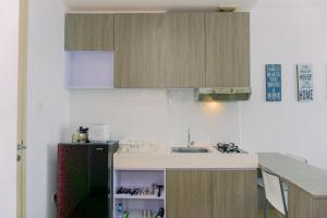 Cozy Living Studio Apartment Tree Park City BSD By Travelio