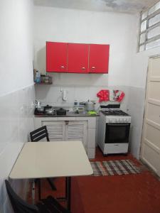 Quarto e cozinha com garagem em Mongaguá