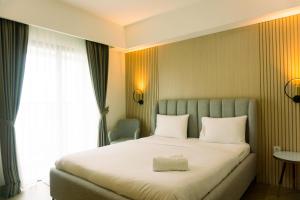 Well Furnished and Elegant 1BR at Bintaro Embarcadero Apartment By Travelio