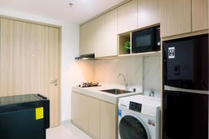 Well Furnished and Elegant 1BR at Bintaro Embarcadero Apartment By Travelio