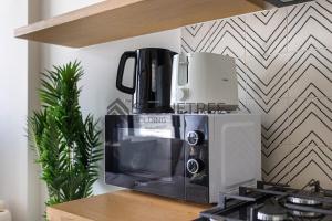 Bright 1BR at Collective Tower 1 Near Hills Mall