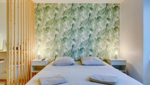 Appartements Le Jade - Appart'Escale : photos des chambres