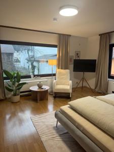 Deluxe-Family Apartment mit Terrasse, Küche & Parkplatz