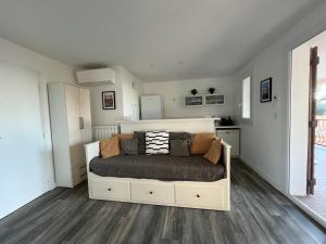 Appartements Bas de villa, vue mer, terrasse, clim, piscine : photos des chambres