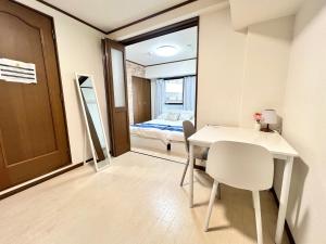 大国町駅徒歩3分 なんば駅1駅 最大4名 ロイヤル507