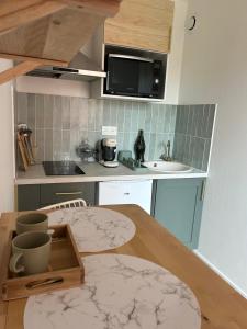 Appartements La Suite Emeraude - Cosy, chic et bord de mer : photos des chambres