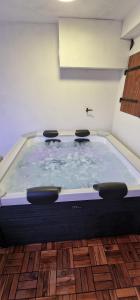Appartements L-Evasion Relaxante Sauna et Spa prive : photos des chambres