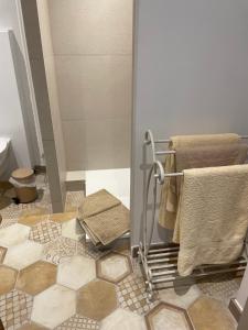 Appartements Au p’tit nid douillet : photos des chambres