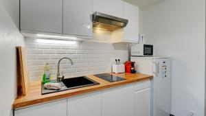 Appartements Le Roze - Appart'Escale : photos des chambres