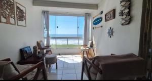 Apartamento aconchegante frente para o mar