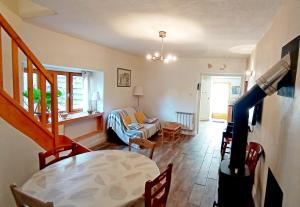 Maisons de vacances Ancien Chais, aire de loisirs avec piscine : photos des chambres