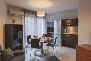 Le Rivieira garage et terrasse, au bord du Lez