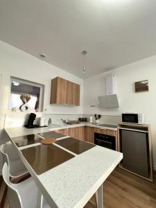 Appartements Casa Armando, beau F2, 2 places de parking clos, proche Disneyland : photos des chambres