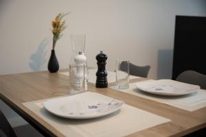 Appartements Le Passementier, T2 duplex grand volume parking souterrain wifi Netflix : photos des chambres
