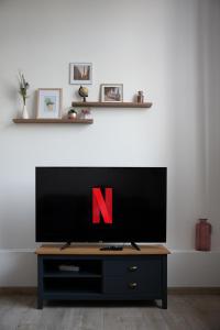Appartements Le Passementier, T2 duplex grand volume parking souterrain wifi Netflix : photos des chambres