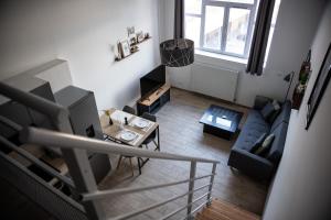 Appartements Le Passementier, T2 duplex grand volume parking souterrain wifi Netflix : photos des chambres