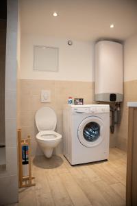 Appartements Le Passementier, T2 duplex grand volume parking souterrain wifi Netflix : photos des chambres