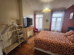 Appartements L -Echappee Cambresienne : photos des chambres
