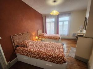Appartements L -Echappee Cambresienne : photos des chambres