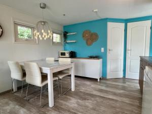 Modern chalet in Campanula Park with garden