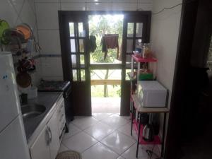 Quarto individual en casa compartilhada en Fortaleza da Barra da Lagoa