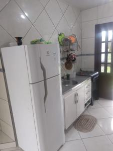 Quarto individual en casa compartilhada en Fortaleza da Barra da Lagoa