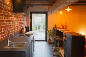 Appartements La Ferme 1802 : photos des chambres
