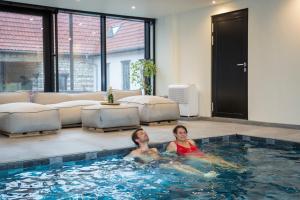 Appartements La Ferme 1802 : photos des chambres