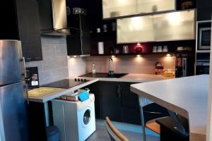 Appartements Cosy F1 avec grande terrasse a 2 pas du tramway : photos des chambres