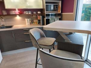 Appartements Cosy F1 avec grande terrasse a 2 pas du tramway : photos des chambres