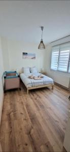 Appartements Caprices des vagues - A 300 m de la plage et a 4 kilometres de Nausicaa, Place de parking privee, Eau douce, Netflix, Primes Video, Wifi haut debit : photos des chambres
