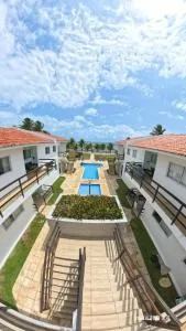 Apartamento Pé na areia no condomínio Manga Verde - 伊塔马拉卡