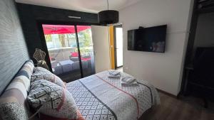 Maisons de vacances Maison de 102m² sur terrain clos terrasse Jacuzzi : photos des chambres