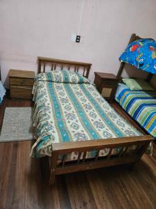 Habitación con cama matrimonial mas cama 1 plaza